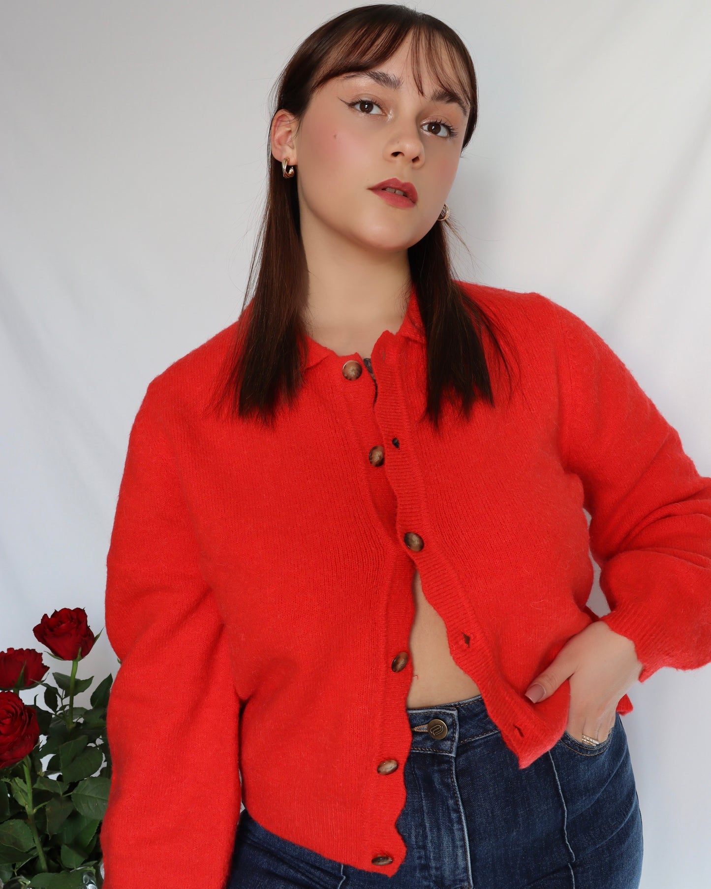 Le cardigan rouge